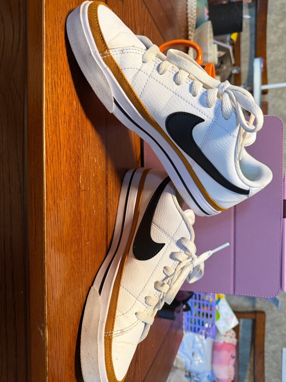 Nike Women’s White Leather Low-Top Sneakers with Black Swoosh